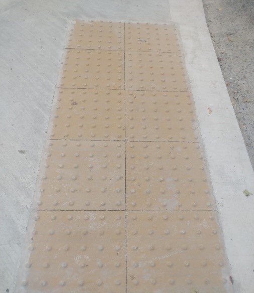This image shows tactile blister pavement inserts
