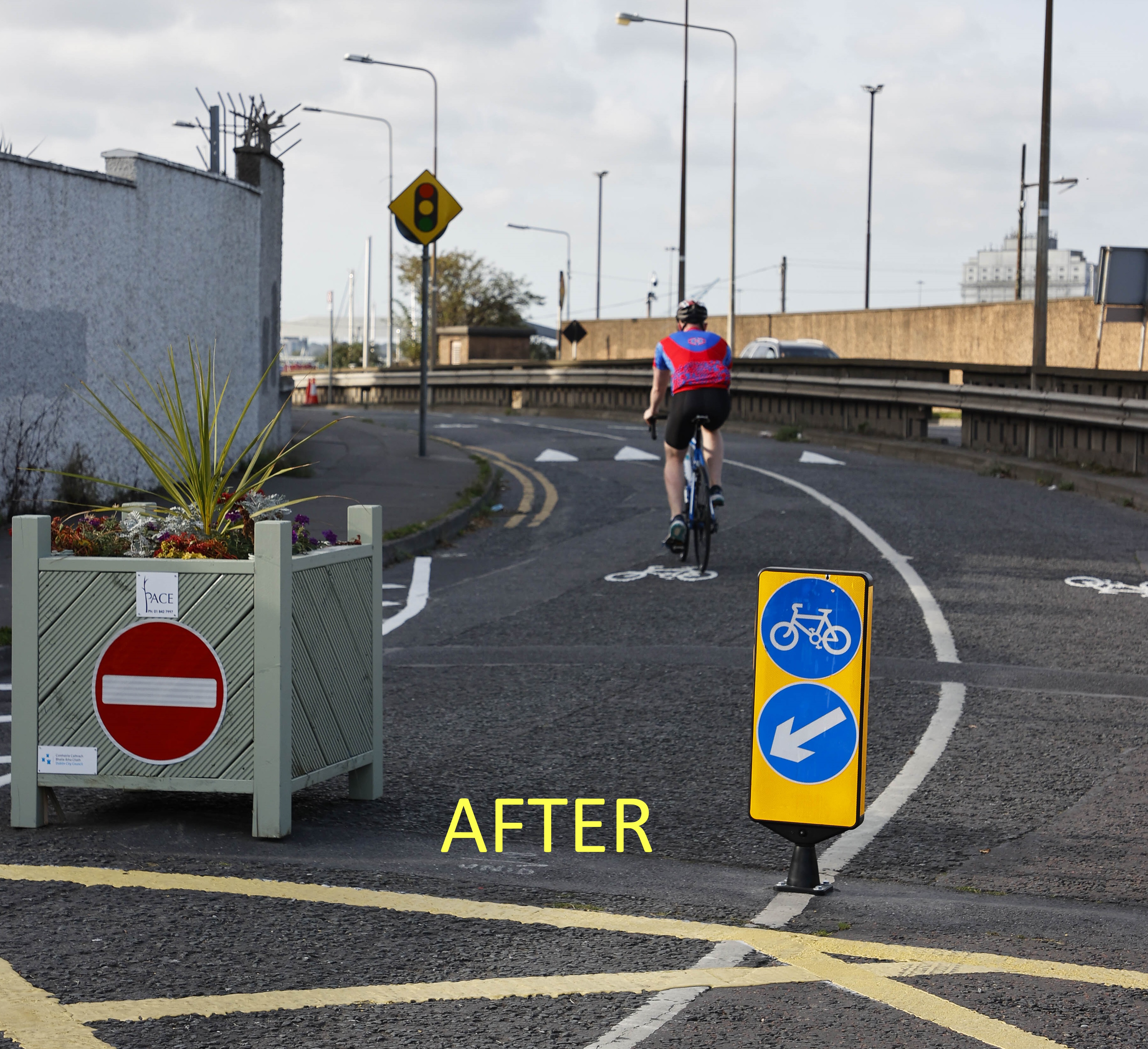 This image show Pigeon House Road after the filtered permeability scheme is installed. There is no traffic congestion and a cyclist is using the route.